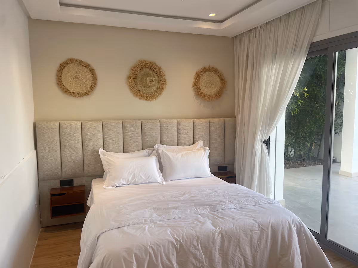 Bedroom with sliding doors to the pool