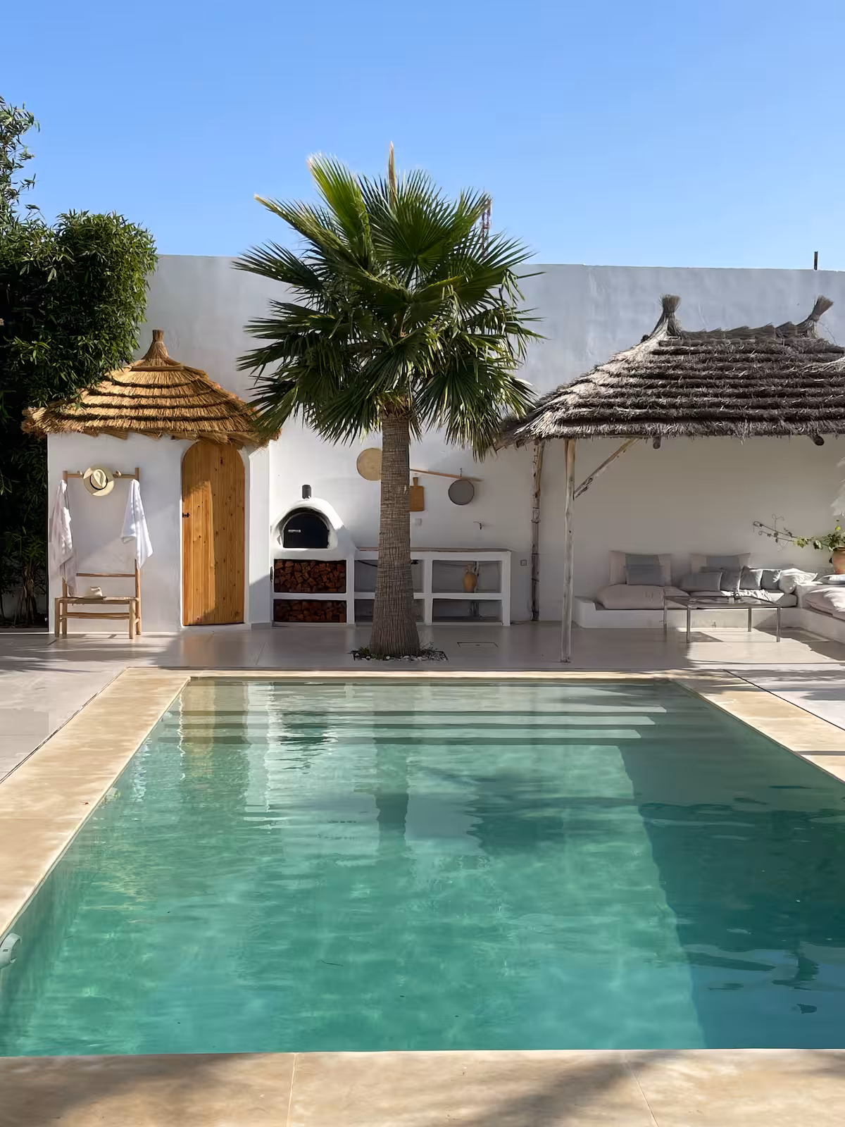 Private pool and outdoor lounge at a Nūr-managed villa in Tangier